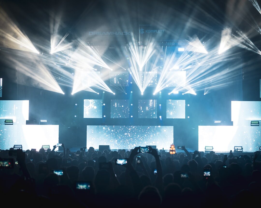 Empty concert stage with colorful spotlights and haze